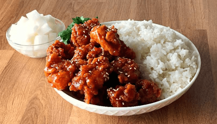 bowl of chicken and rice